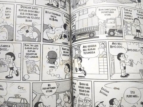 close up of an opened a Japanese doraemon comic book