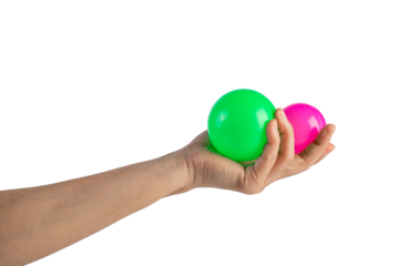 Pink and green plastic ball in hand, transparent background