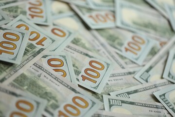 Big amount of american USD hunderd dollar bills banknotes close up