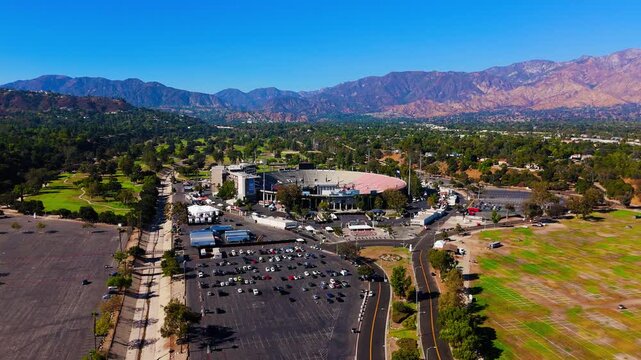 Wide aerial view of Rose Bowl Stadium Pasadena with mountains September 5 2025