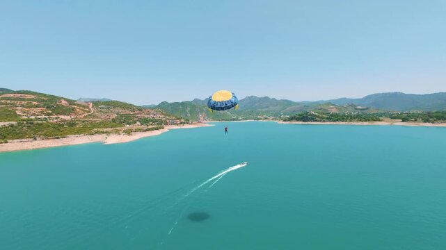 Parasailing, Aquatic sports during summertime in the beautiful lake.