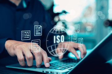 Business people working Laptops with ISO standards quality control concept, assurance warranty, Quality control standards, Researching international standards organization, Business technology concept