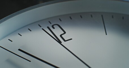 Macro Close Up Shot of Clock Dial. Camera Following the Second Hand on Minimalist Wall Clock. Contemporary Design Element of Interior. Concept of Time, Punctuality, Time Management and Lifestyle.