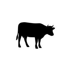 A black silhouette of a cow with horns and an udder, looking upwards, isolated on a white background.