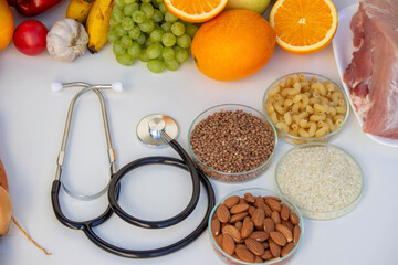 Healthy Eating and Medicine: Stethoscope, Fruits, Vegetables, and Grains
