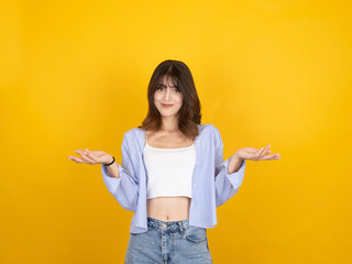 Woman spreading hands aside, portrait of young caucasian 20s trendy cute woman spreading hands...
