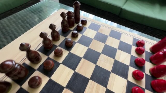 Wooden Chess Set on Glass Table