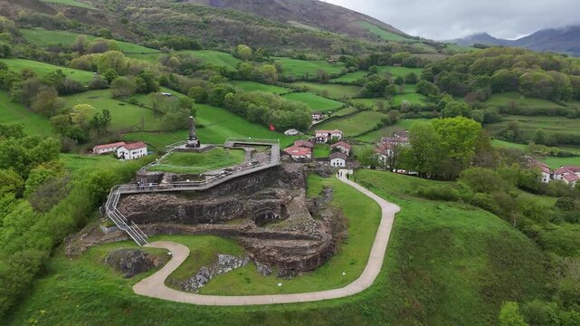 Aerial view of Amaiur village and its historic ruined castle at Nafarroa, Basque Country.