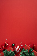 Vibrant vertical red backdrop with wrapped gifts, ribbons, and ornaments evokes Christmas and New Year cheer, perfect for holiday campaigns, greetings, and festive promotions © ActionGP