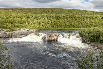 The Pikefossen waterfall in Norway on the Kautokeinoelva river