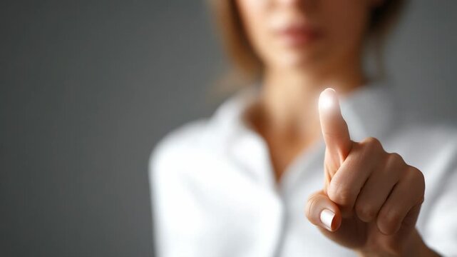 Watch as a person interacts with light, making it appear and vanish by touch.