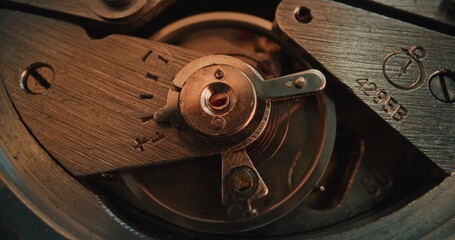 Macro Close Up Shot of Intricate Watch Mechanism with Moving Gears and Balance Wheel. Detailed Look Into Clock Mechanical Engineering, Precision Craftsmanship and the Inner Workings of Timepieces.