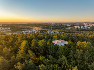 Observation tower on Kozacza Góra hill in Gdańsk, Poland, panoramic drone view at sunset © Wojciech
