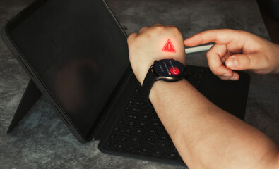 Woman rejecting scam call on smartwatch. Warning message to prevent scams, fraud and identity theft on watch. Mobile security against cybercrime.