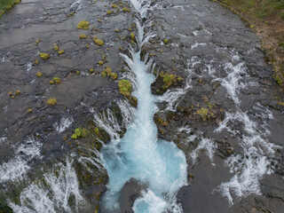 Aerial View of Bruarfoss Waterfall in Iceland with Turquoise Glacial Water
