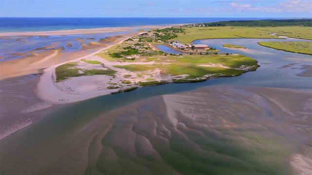 Aerial view of the tranquil coastal New England landscape, where the sandy beach meets the ocean. Gray's Beach, Yarmouth Port, Cape Cod, Massachusetts, United States.