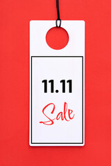 11.11 single day sale concept. White tag on red background