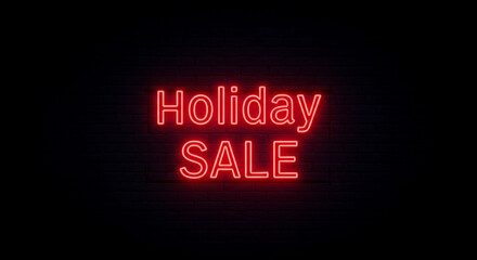 Neon sign displaying 'Holiday SALE' against a dark background  