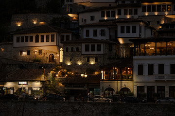 Traditional houses illuminated at night in old town