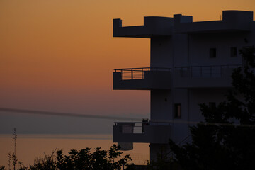 Sunset with silhouette of building