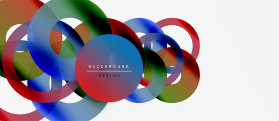 Abstract colorful circles overlap. Dynamic composition creates modern visual effect. White background emphasizes vibrant hues.
