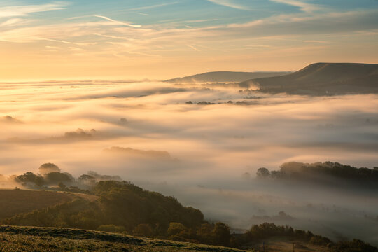 Misty September morning from the view east from the top of Mount Caburn on the Lewes Downs east Sussex south east England UK
