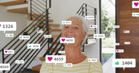 Heart icon appearing by senior woman sparking social media reactions around her, driving engagement - Powered by Adobe