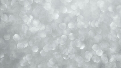 Abstract silver glitter sparkle texture with bokeh background