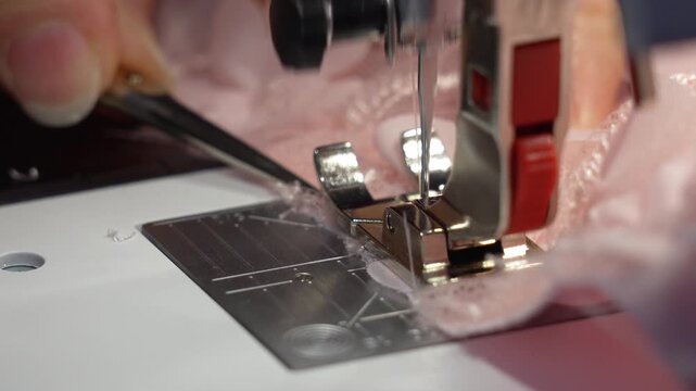 Crafting lace details while sewing fabric in a cozy home workspace