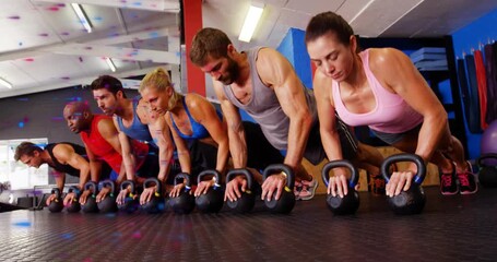 Six fitness participants starting plank on kettlebells, bending elbows to strengthen core muscles - Powered by Adobe