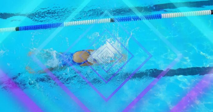Female swimmer initiating freestyle stroke under lane rope for sports with overlays showing form