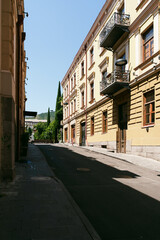 Charming street view in a historic district showcasing elegant architecture and serene atmosphere