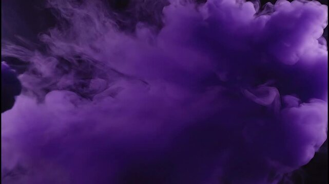 Dynamic purple smoke explosion against a dark background creating a vibrant, abstract visual effect perfect for design projects