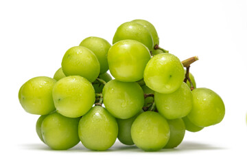 Close up of fresh green grapes with water drop on a white background