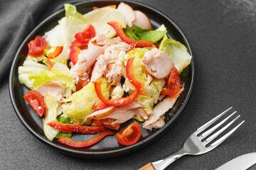 Chicken salad with lettuce tomato and red pepper concept for homemade meal or bistro lunch menu photography