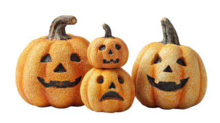 Set of three different size carved pumpkins with various faces, isolated on transparent background 