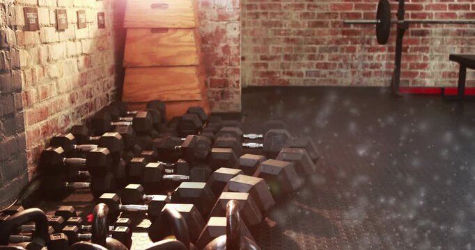 camera opening on floor panning right revealing weights boxes bench, drifting dust showing textures