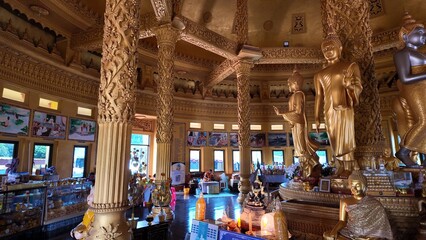 An interior view of a Hindu temple, characterized by its traditional architectural style with...