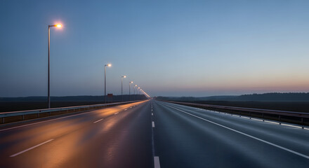Empty highway at dusk, illuminated by glowing streetlights. Reflections shimmer on the wet asphalt, creating a solitary, serene journey under a vast, darkening sky