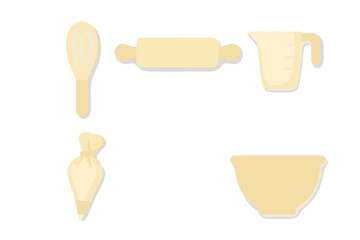 Kitchen utensils and baking tools arranged on a flat surface for baking preparations