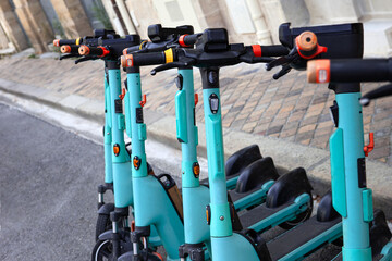 Parking for electric two wheelers