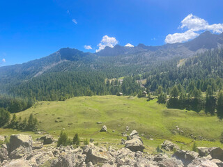 Scenic mountain landscape in the Champorcher Valley, located within the Mont Avic Natural Park in the Aosta Valley, Italy. A small alpine village