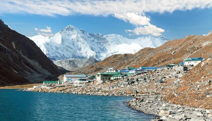 View of Gokyo lake and village with mount Cho Oyu