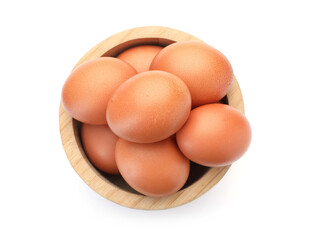 Raw chicken eggs in bowl isolated on white, top view
