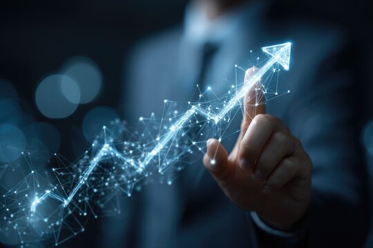 Business person touches a digital upward arrow graph