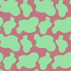 Abstract seamless cow print pattern featuring irregular amoeba spots in vibrant mint green on a bold pastel pink background for a modern Y2K aesthetic design.