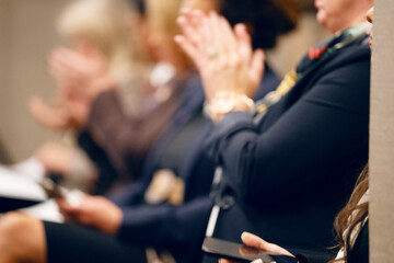 business people clapping