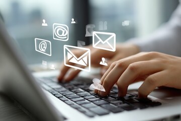 Hands typing on laptop, email icons overlay (2)