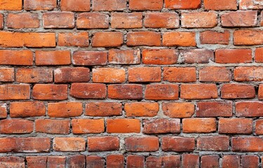 Obraz premium Close-up view of an aged brick wall.