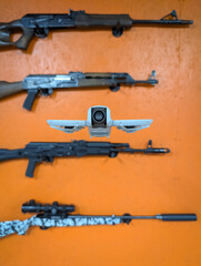 A modern reconnaissance drone representing surveillance and espionage, contrasted with an arsenal...